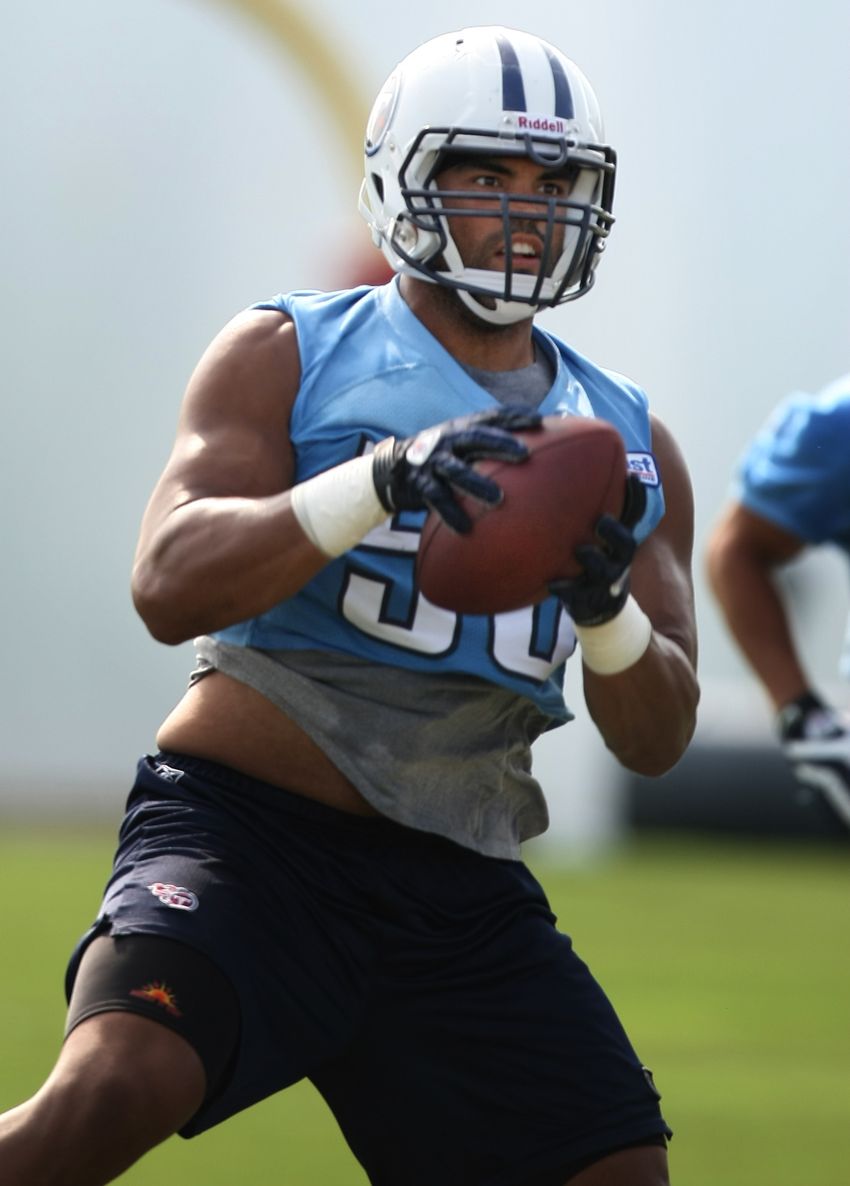 Tennessee Titans linebacker Colin Allred (56) pulls down an interception during practice at Baptist Sports Park Monday in Nashville on Aug. 16, 2010.